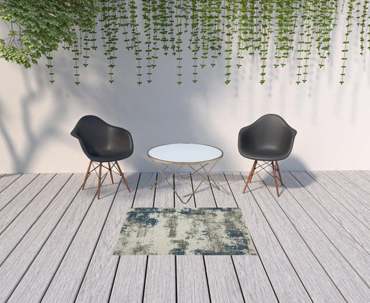 2' X 7' Blue and Beige Abstract Stain Resistant Indoor Outdoor Area Rug