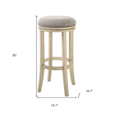 30" Gray and Ivory Fabric and Solid Wood Backless Bar Height Swivel Bar Chair