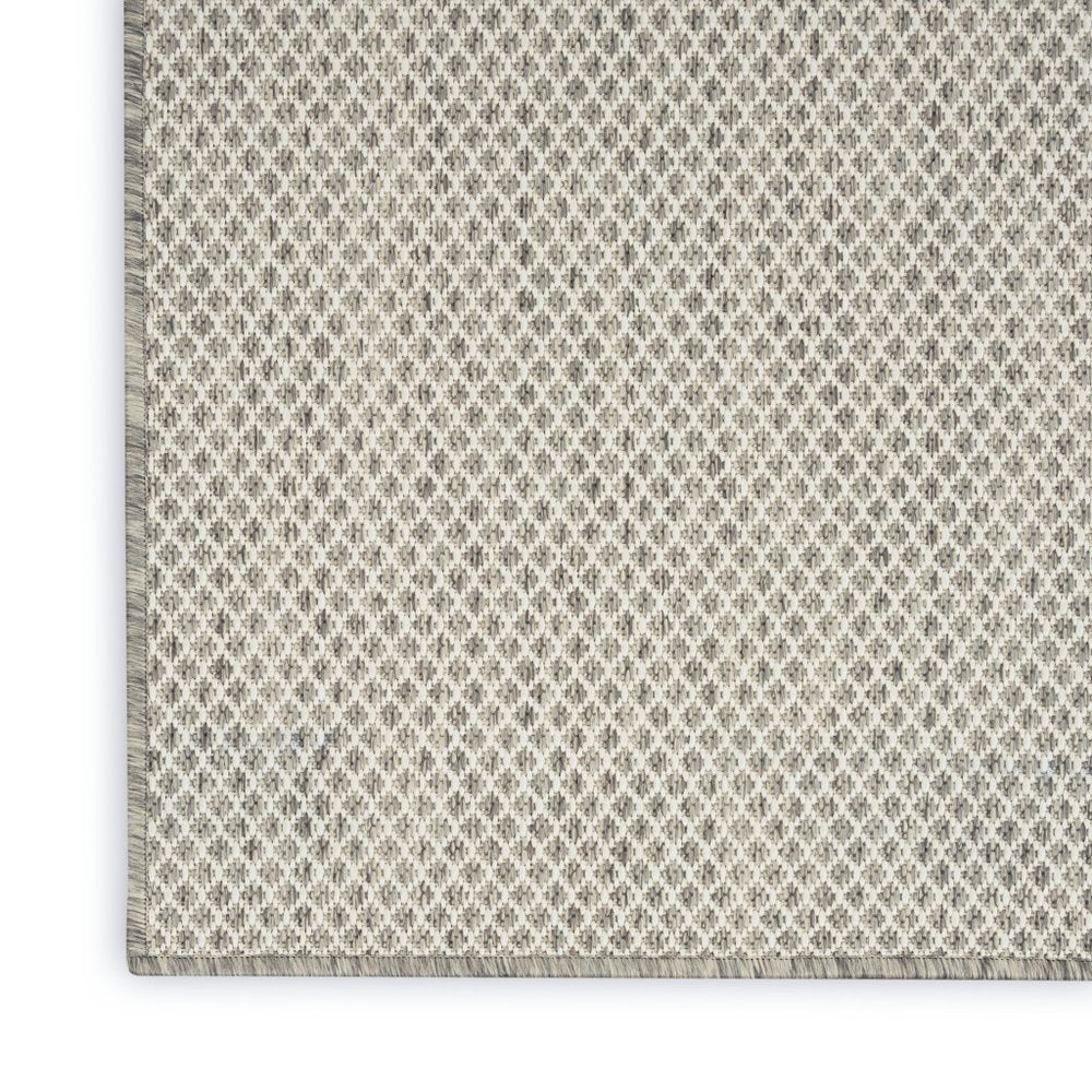 6' X 9' Ivory and Silver Indoor Outdoor Area Rug