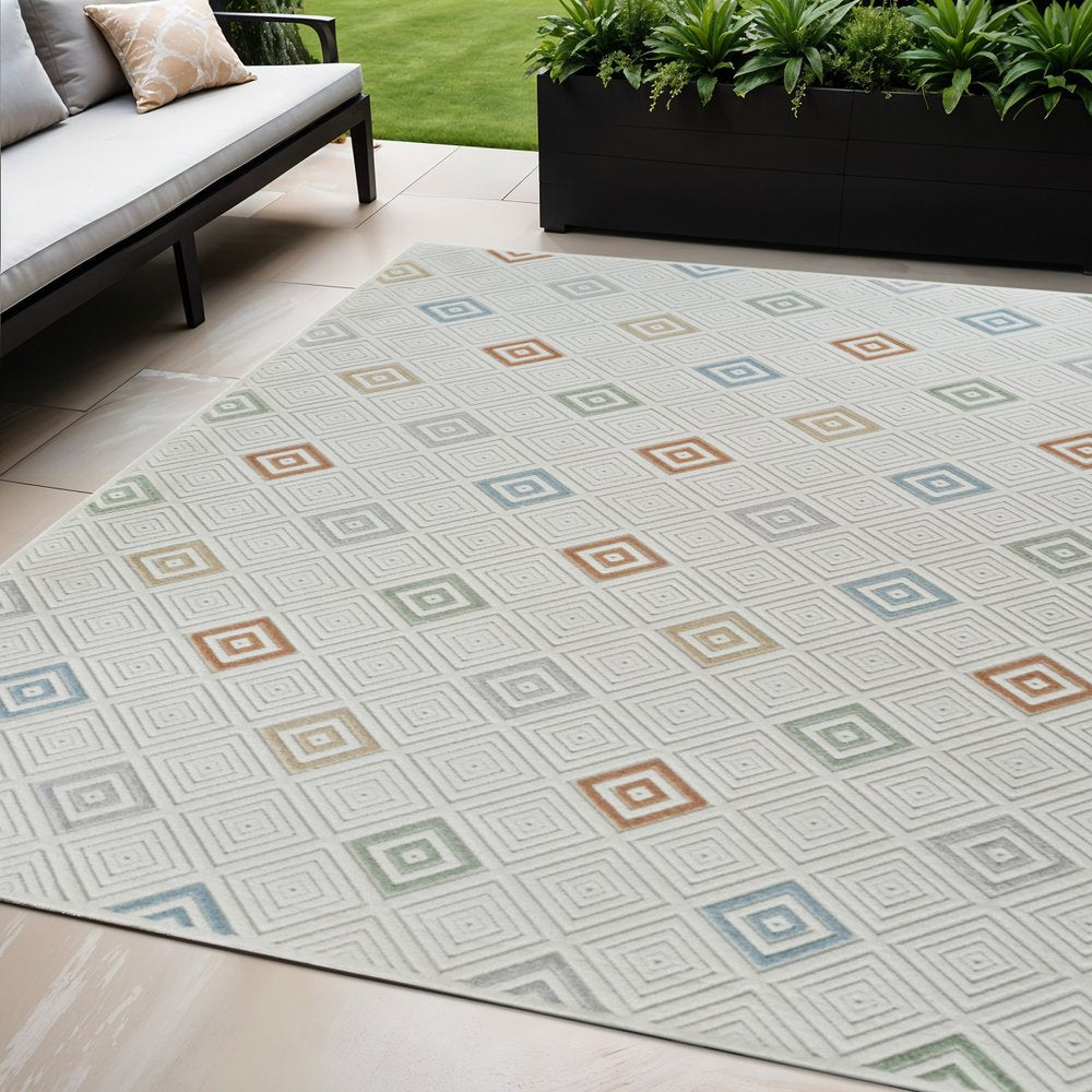 5' X 7' Cream and Beige Geometric Distressed Indoor Outdoor Area Rug
