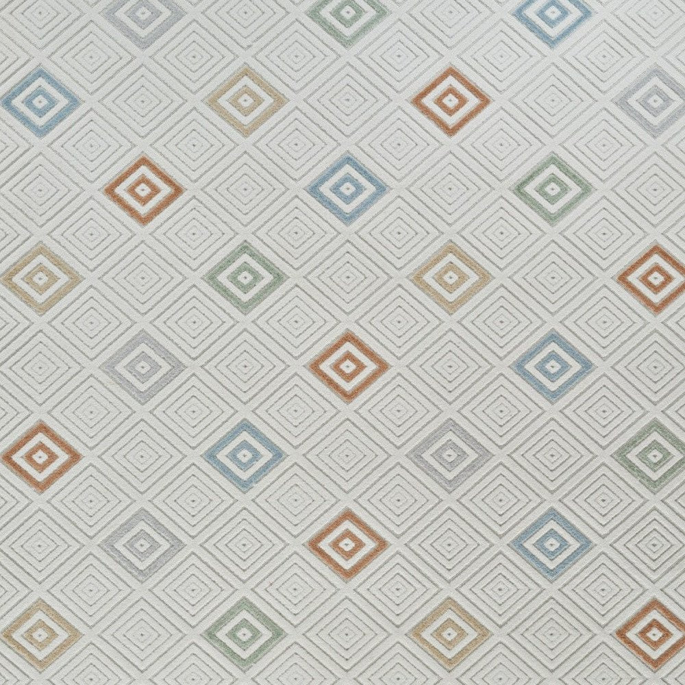 5' X 7' Cream and Beige Geometric Distressed Indoor Outdoor Area Rug