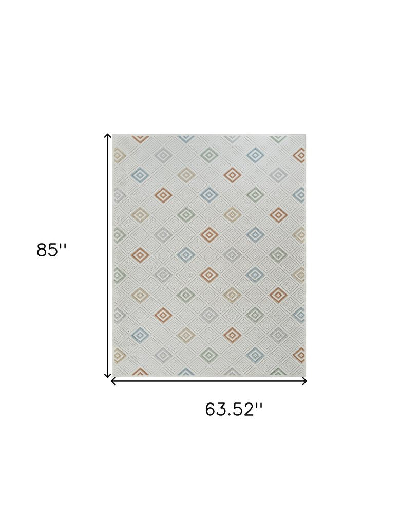 5' X 7' Cream and Beige Geometric Distressed Indoor Outdoor Area Rug