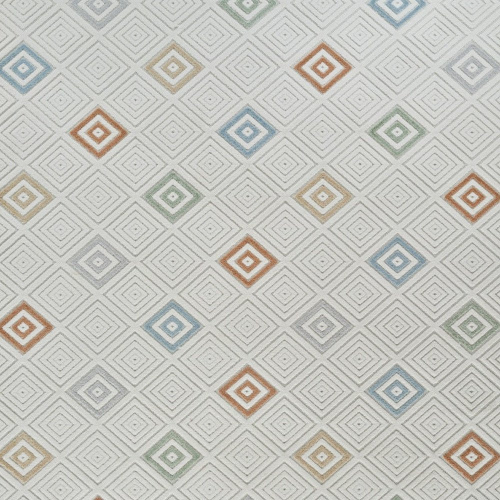 5' X 7' Cream and Beige Geometric Distressed Indoor Outdoor Area Rug