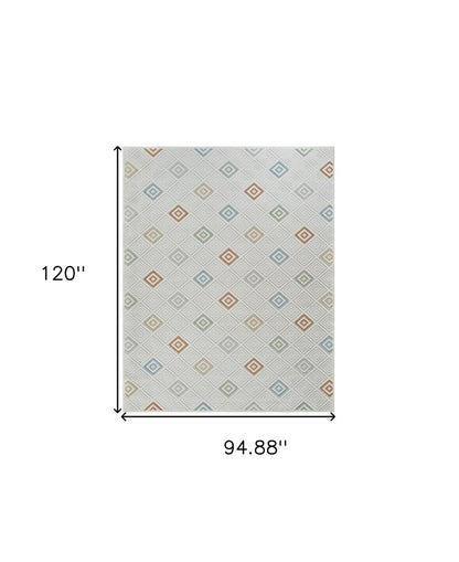 5' X 7' Cream and Beige Geometric Distressed Indoor Outdoor Area Rug