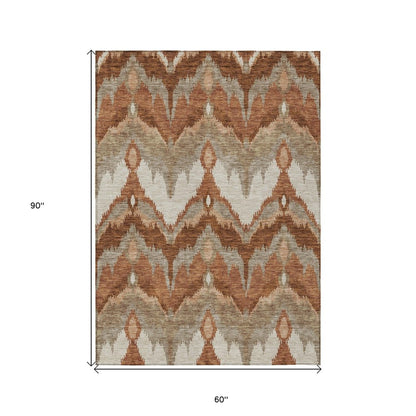 3' X 5' Orange Beige And Copper Ikat Washable Indoor Outdoor Area Rug