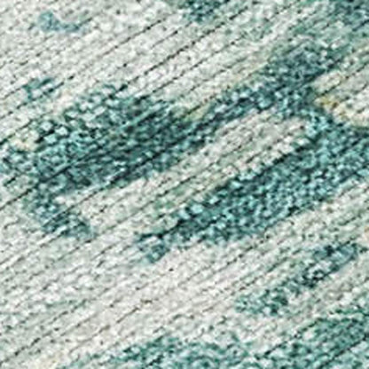 9' X 12' Teal Blue And Ivory Abstract Washable Indoor Outdoor Area Rug