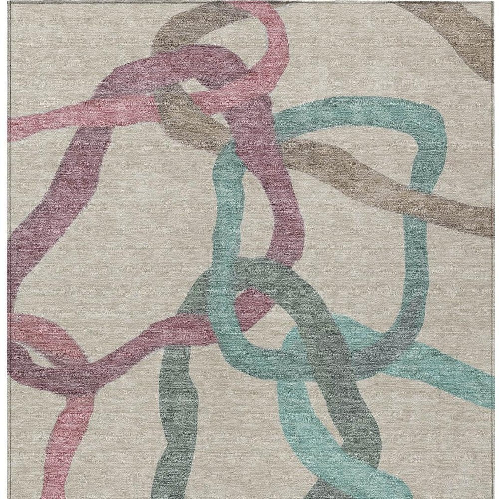 9' X 12' Tan Blue And Mauve Abstract Washable Indoor Outdoor Area Rug