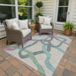 9' X 12' Tan Blue And Mauve Abstract Washable Indoor Outdoor Area Rug