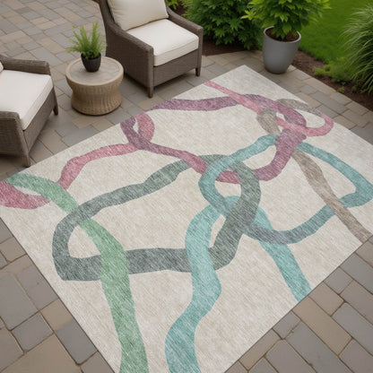 9' X 12' Tan Blue And Mauve Abstract Washable Indoor Outdoor Area Rug