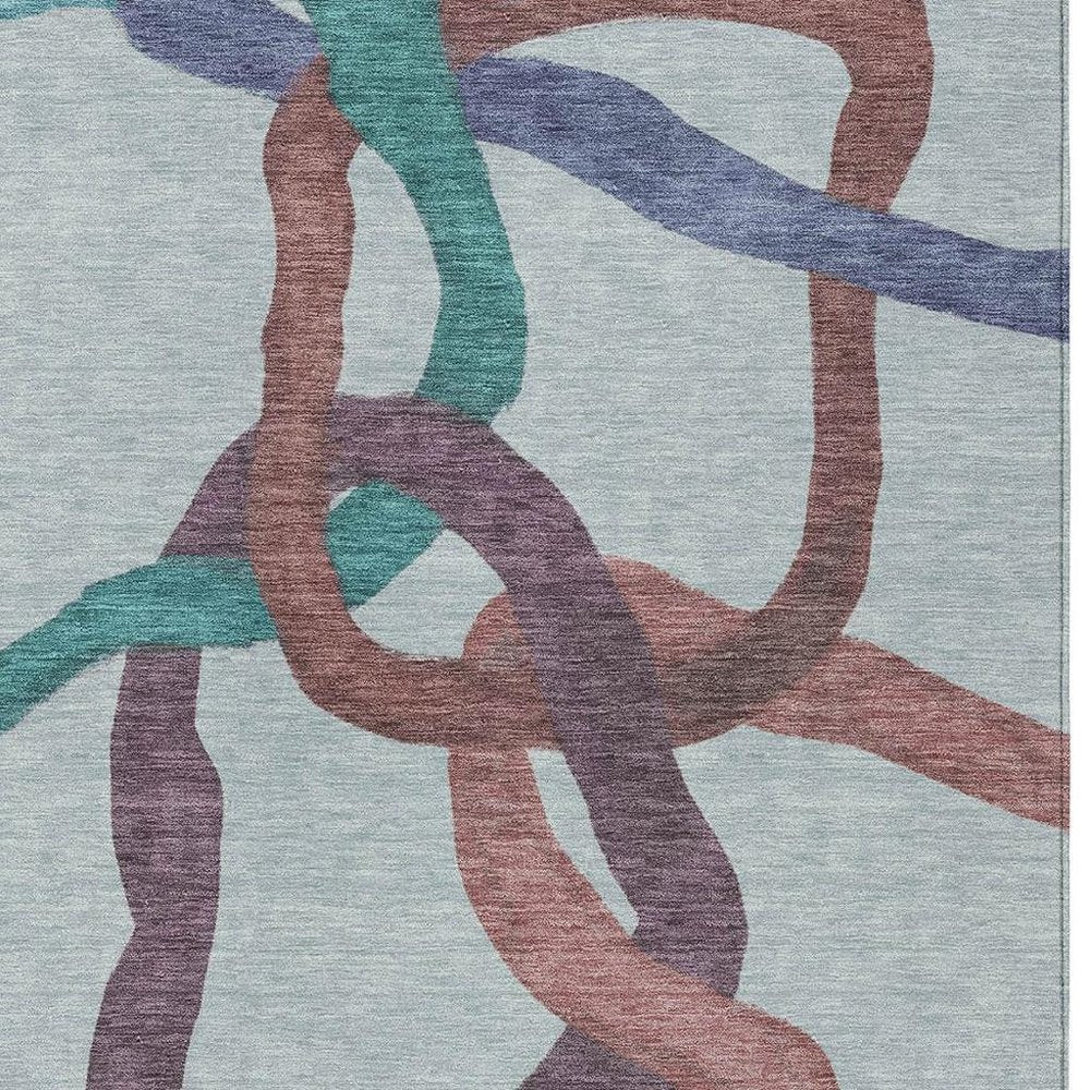 9' X 12' Teal Blue Red And Mauve Abstract Washable Indoor Outdoor Area Rug