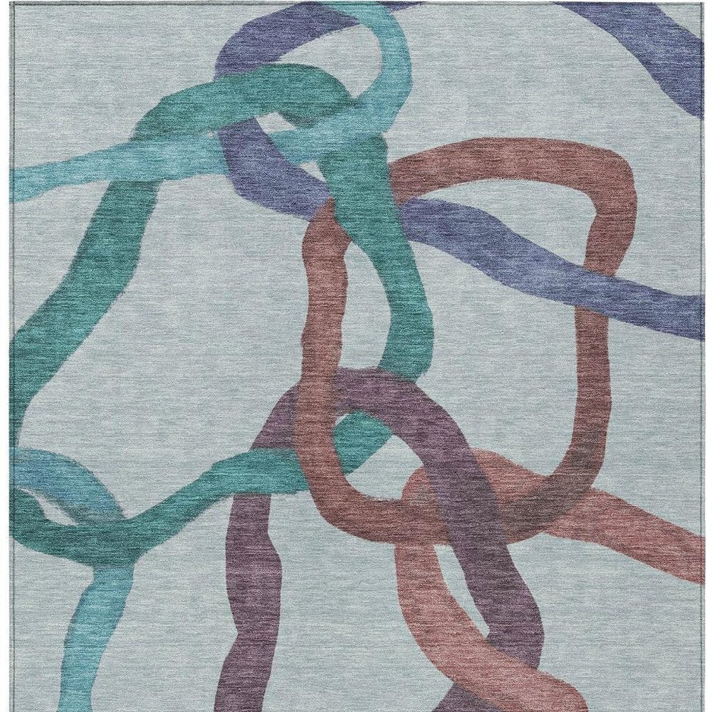 9' X 12' Teal Blue Red And Mauve Abstract Washable Indoor Outdoor Area Rug