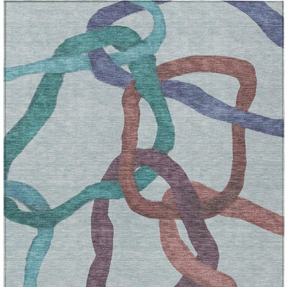 9' X 12' Teal Blue Red And Mauve Abstract Washable Indoor Outdoor Area Rug