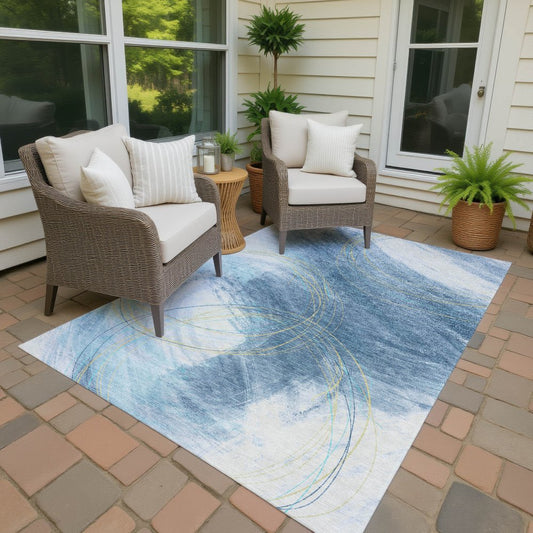9' X 12' Sky Blue Gold And Ivory Abstract Washable Indoor Outdoor Area Rug