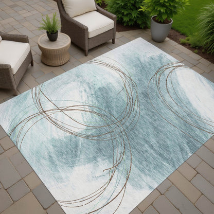 9' X 12' Teal Blue Brown And Ivory Abstract Washable Indoor Outdoor Area Rug