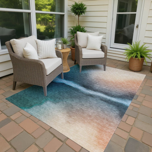9' X 12' Teal Blue Salmon And Ivory Abstract Washable Indoor Outdoor Area Rug