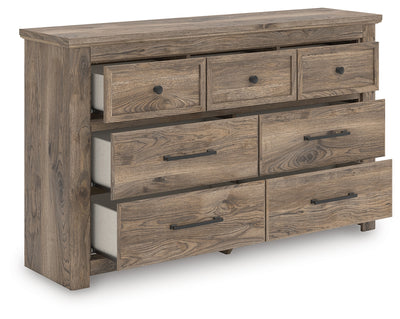 Evee Outdoor & More - Ashley Furniture - Rusticott Bedroom - Seven Drawer Dresser / Brown - PCB2260-31