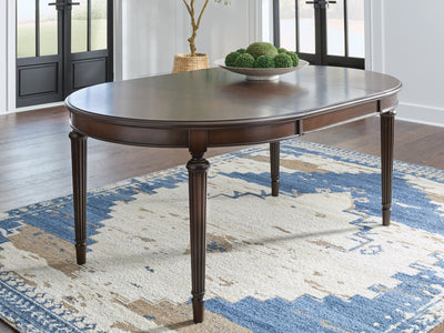 Evee Outdoor & More - Ashley Furniture - Lavinton Dining Room - Oval Dining Room EXT Table / Brown - D764-35