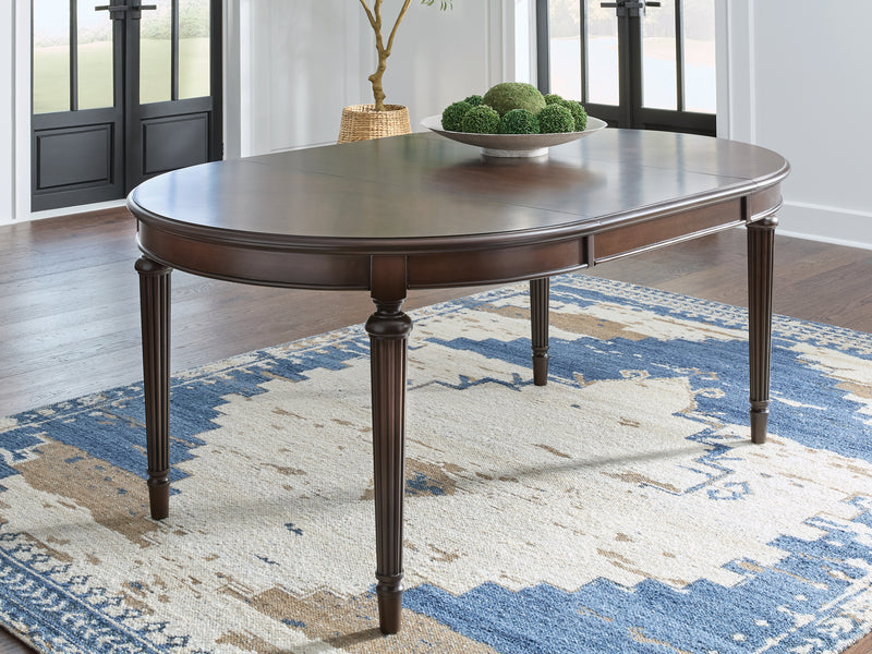 Evee Outdoor & More - Ashley Furniture - Lavinton Dining Room - Oval Dining Room EXT Table / Brown - D764-35