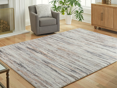 Evee Outdoor & More - Ashley Furniture - Nace Rug - 7'6" x 9'6" Area Rug / Gray/Brown/White - R407471
