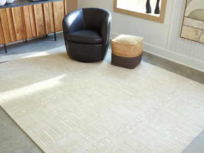 Evee Outdoor & More - Ashley Furniture - Wolbert Rug - 7'8" x 10' Area Rug / Tan/Ivory - R407661