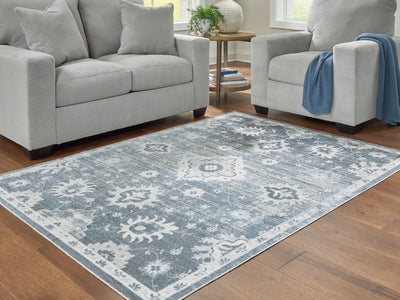 Evee Outdoor & More - Ashley Furniture - Avanworths Rug - Washable 5'3" x 7' Area Rug / Blue/Gray/Ivory - R407792