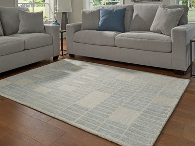 Evee Outdoor & More - Ashley Furniture - Dylanton Rug - 7'8" x 10' Area Rug / Ivory/Blue - R407811